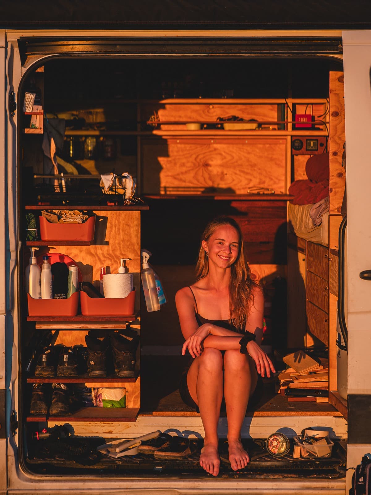 Portrait of the author in a van at sunset